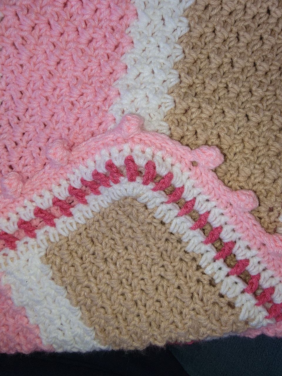 sample handmade crocheted blanket in pink and, tan and white by Rebecca Harrison MyCrochetLife.com 